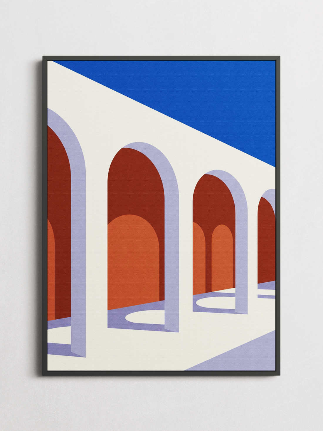 Framed Sunlit Arches poster hanging on a warm cream wall without visible fixings