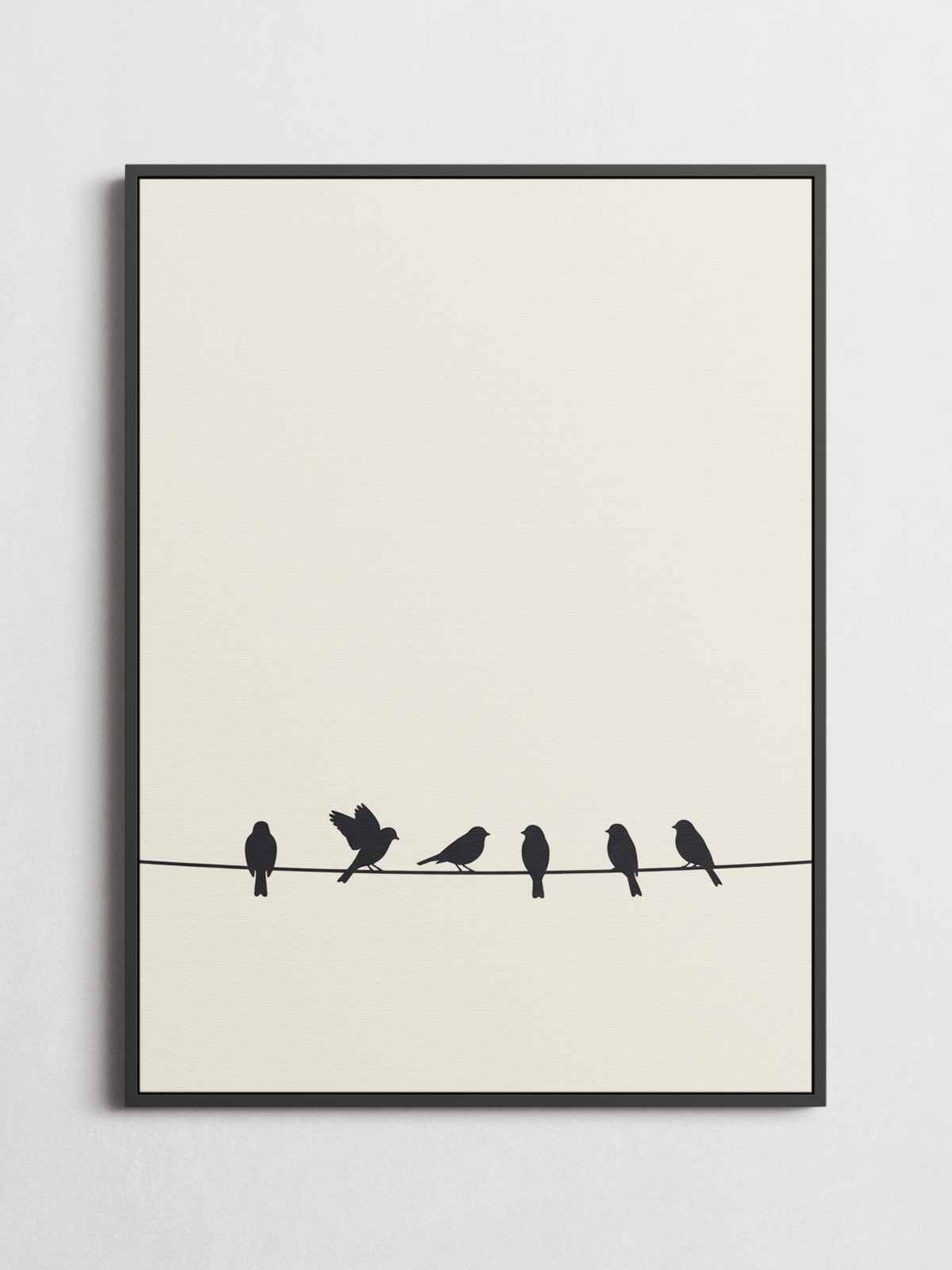 Birds on a Wire minimalist poster framed on a wall