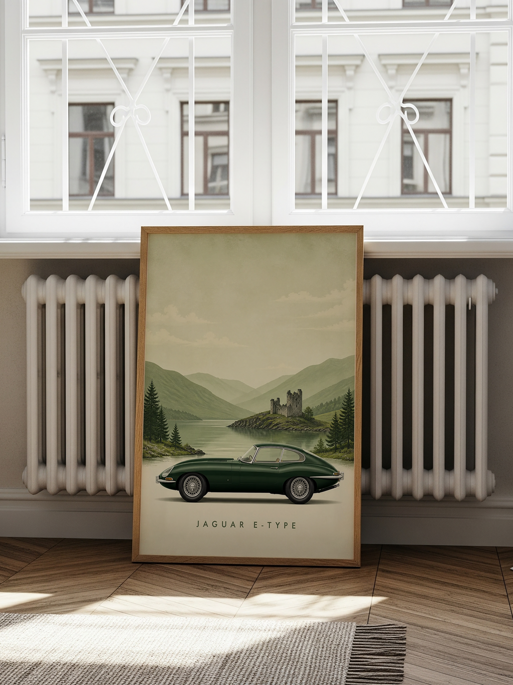 Jaguar E-Type classic car poster in British racing green by a misty Highland loch with a ruined castle