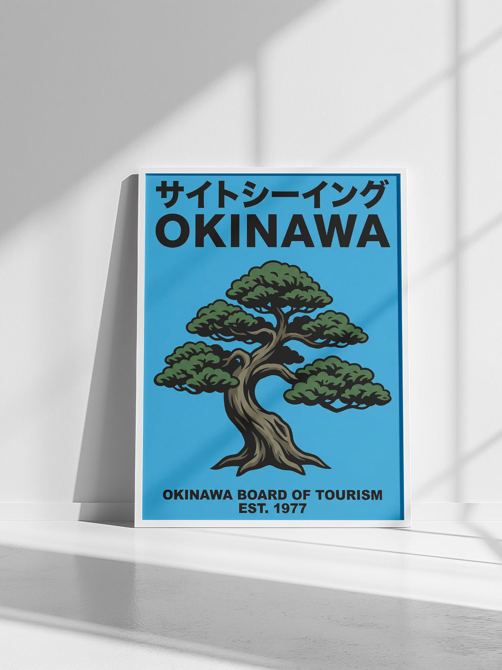 Okinawa Japanese travel poster shown framed in a styled interior